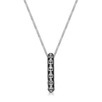 Men's Skull Pendant with Howlite Accent in Sterling Silver
